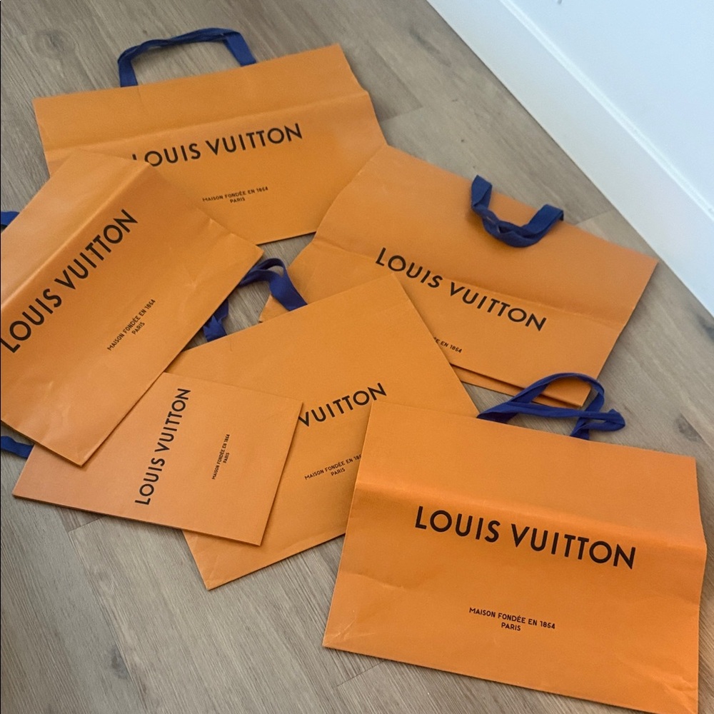 Authentic Louis Vuitton Orange Bags with Blue Handles and a brown six total
